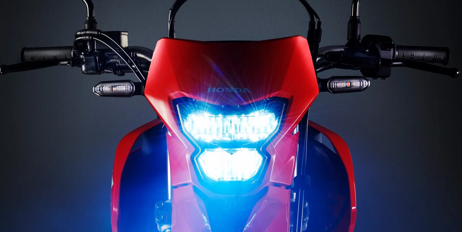 farol-frontal-xr-300l-tornado-vermelho-fighting-red